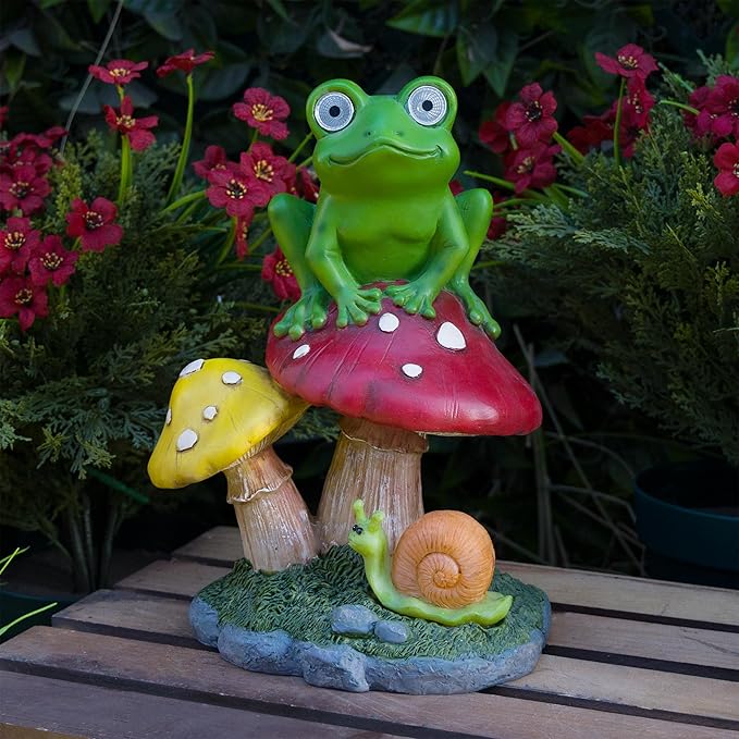 Alpine Corporation ZEN390SLR-S Frog on Mushroom Statue with LED Lights, Solar-Powered LED Frog Garden Statue, 12" H, Green